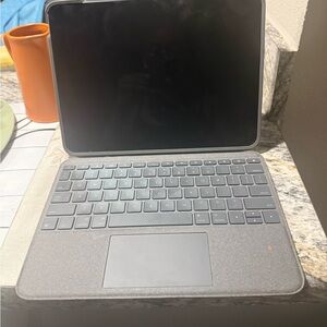 Apple Tablet with Gray Keyboard Case